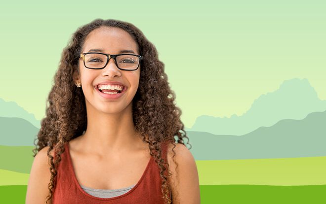 Young woman smiling in front of illustrated field