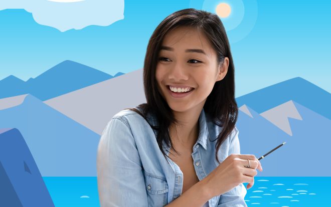 Young woman smiling in front of lake and mountains