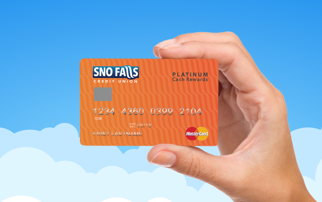 Hand holding Sno Falls Platinum Cash Rewards credit card.