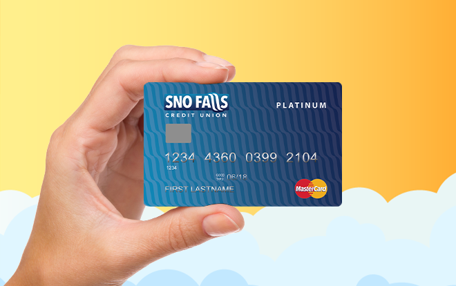 Hand holding Sno Falls Mastercard Platinum credit card.