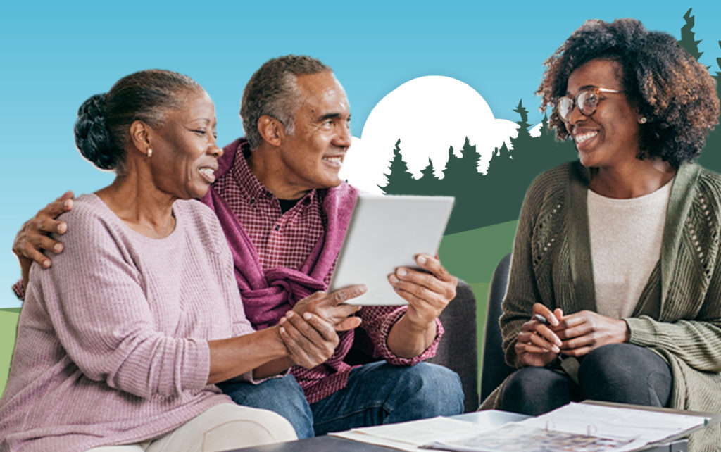 Parents and adult daughter looking at a tablet